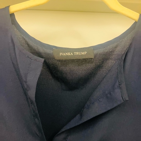 Navy short sleeve blouse with no size but fits like a medium - Picture 2 of 2